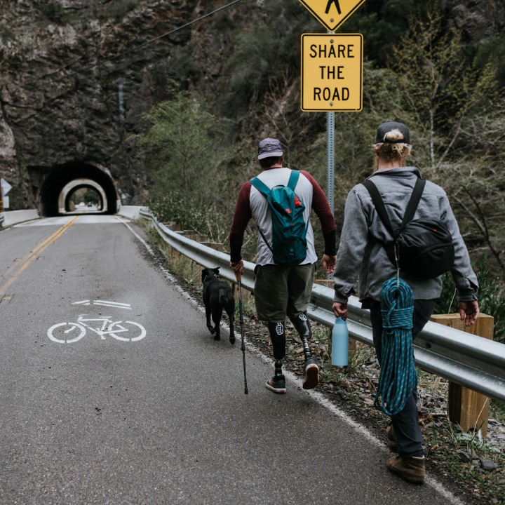 This is not staged at all, nothing that we shoot together is! We genuinely walked by this sign: share the road with the upper visual of legs! Another subtle testimony of what it means to be an integrated community, people help each other and share the road!