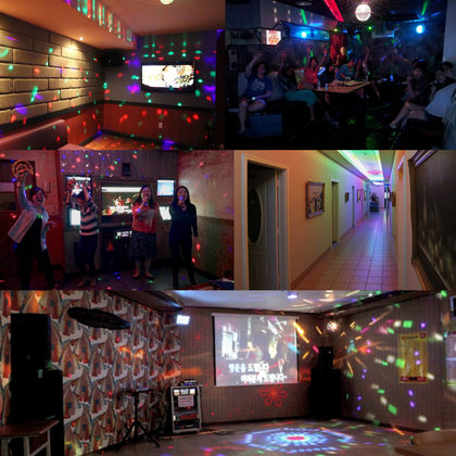 The core of the film is set in a large noraebang (노래방 – Karaoke room where people go to sing) equipped with disco lights, tambourines and song books.