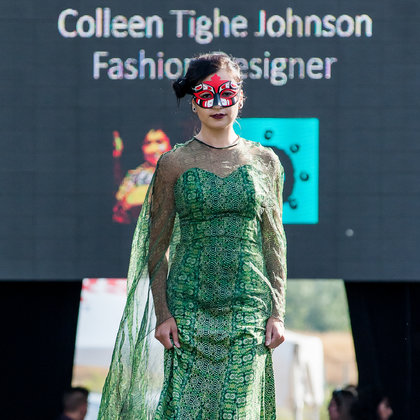 Australian fashion designer Collen Tighe Johnson shows her collection at the World Fusion of Wearable Art Fashion Show. Hand painted mask by local artist Erik Prytula.