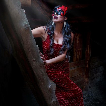 Model Heather Lewis in the traditional Pithouse of the Secwepemc people. Wearing a hand painted mask by Kamloops artist Erik Prytula.