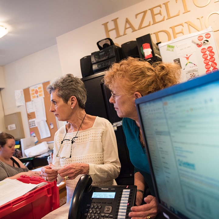 Evanna Brennan and Susan Giles provide care to people living in transitional housing like the Hazelton Residence on Alexander Street in Vancouver. Residents of facilities like the Hazelton are usually transitioning out of homelessness, working towards stable housing where they can be independent. During the Covid-19 crisis, Brennan and Giles helped isolate potential Covid cases, providing care to desperately ill patients while assisting staff undertake quarantine measures.   
