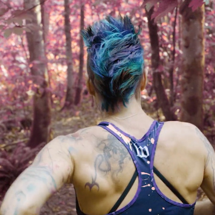 Our second set of visual moments will be stylized recreations or more symbolic moments. Rach has been dubbed “The Purple Tiger” for their charisma, ferocity and personality on and off the course - and of course for often rocking a purple mohawk. 